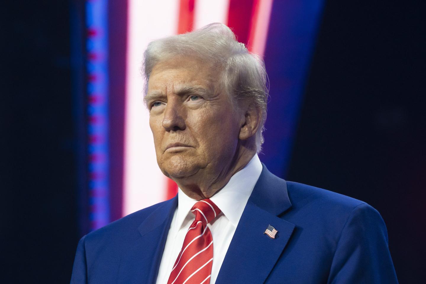 U.S. President-elect Donald Trump looks on during Turning Point USA's AmericaFest at the Phoenix Convention Center on December 22, 2024 in Phoenix, Arizona.