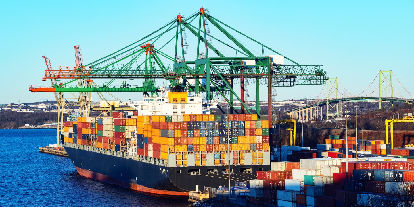 Container ship is docked at port in Halifax, Nova Scotia.
