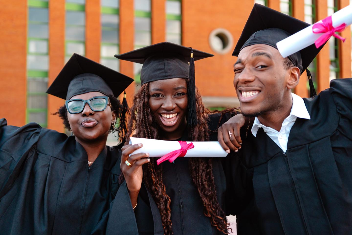 Happy college graduates.