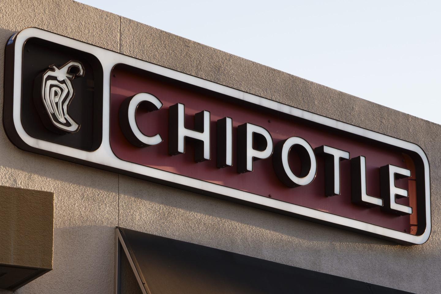 A Chipotle logo is displayed outside their restaurant