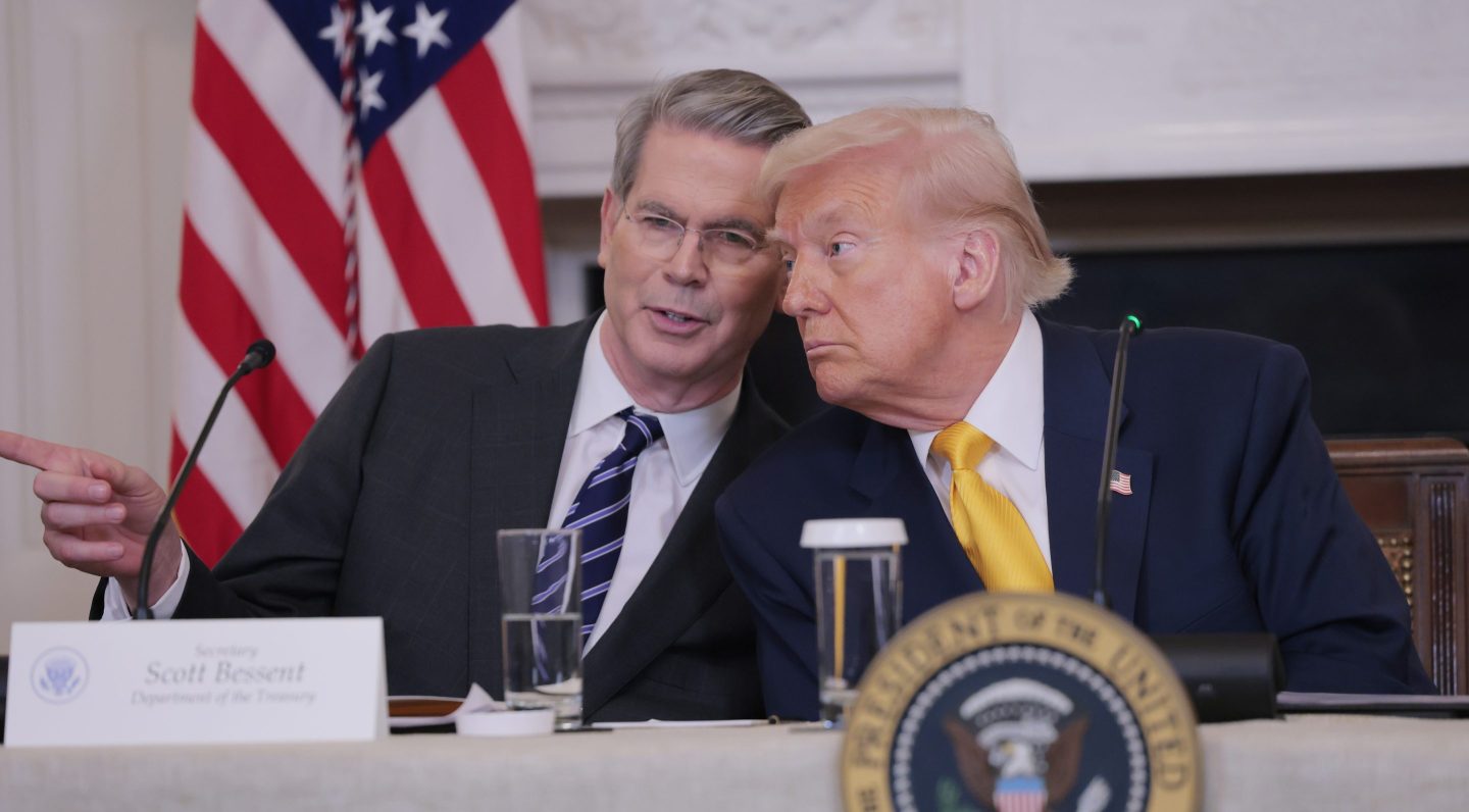 U.S. Secretary of Treasury Scott Bessent and U.S. President Donald Trump look on during The White House Digital Assets Summit in the State Dining Room of the White House on March 07, 2025 in Washington, DC.