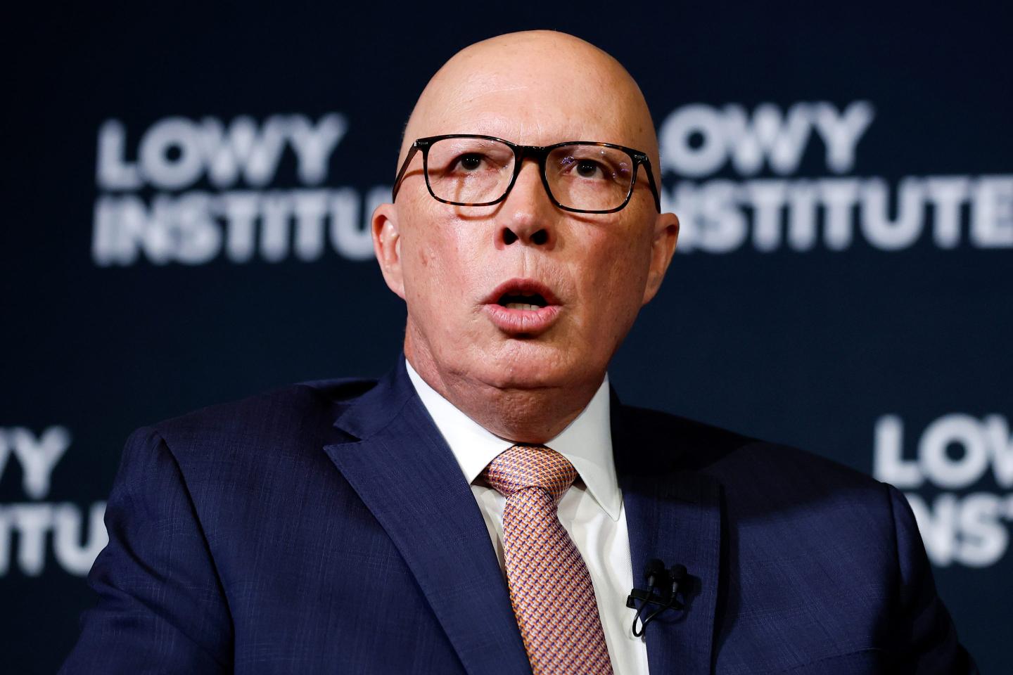 Australian opposition dumps Trump-style return to office policy
