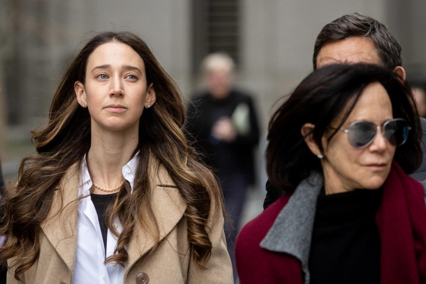 Charlie Javice walking outside a court house.