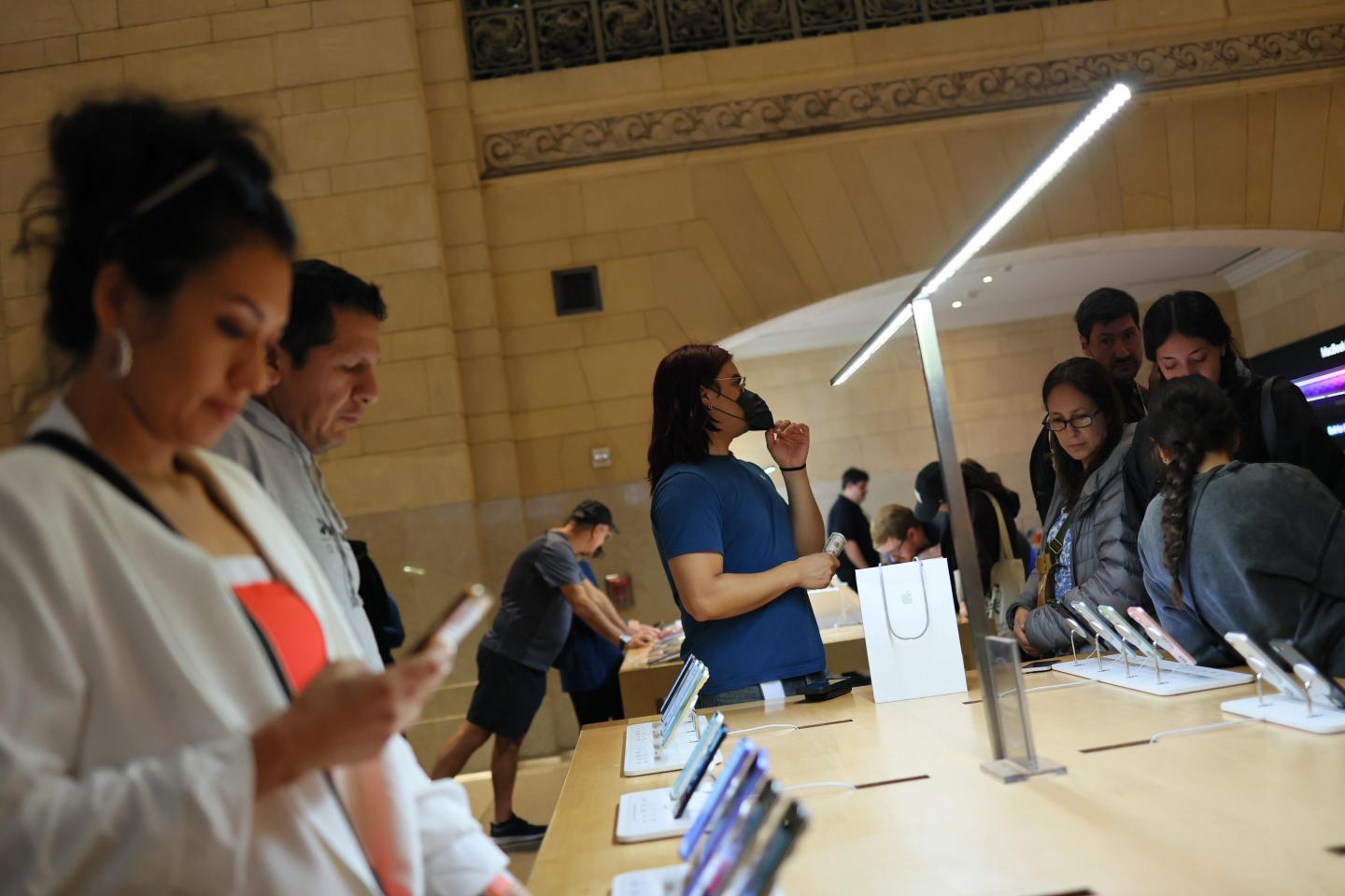 U.S. consumers in ‘survival mode’ cut spending while others flood stores to buy iPhones and cars to prepare for tariff hits