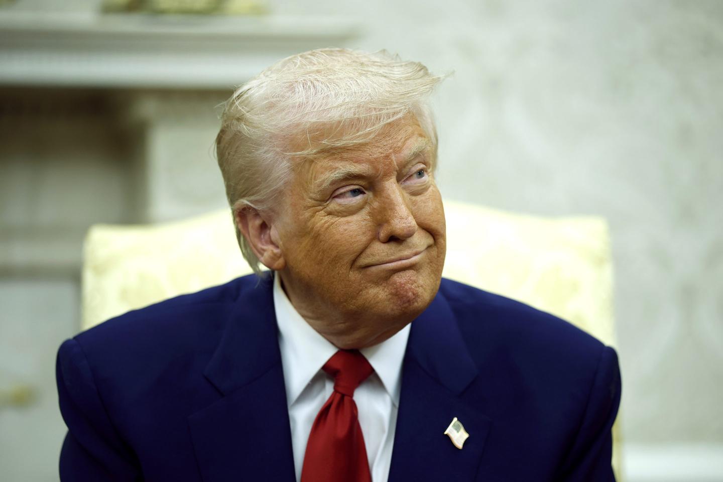 U.S. President Donald Trump answers a reporters question during a meeting with Israeli Prime Minister Benjamin in the Oval Office of the White House on April 7, 2025 in Washington, DC.
