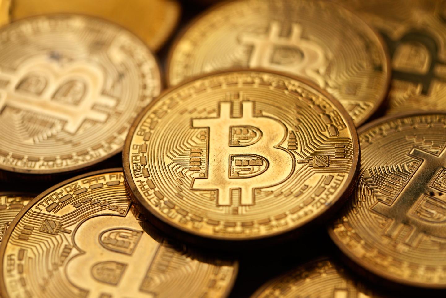 Bitcoin hovers above $90,000 as Trump backs off Powell and trade talks advance