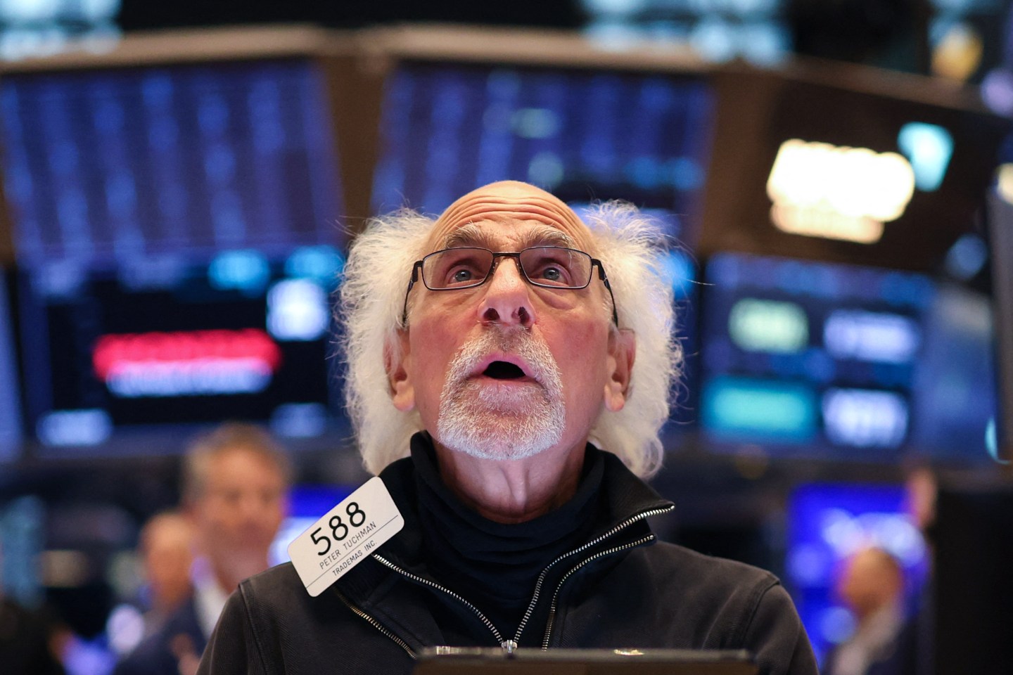 A trader works on the floor of the New York Stock Exchange (NYSE) at the opening bell in New York City, on April 15, 2025. Stocks slid Wednesday on renewed fears of tariffs.