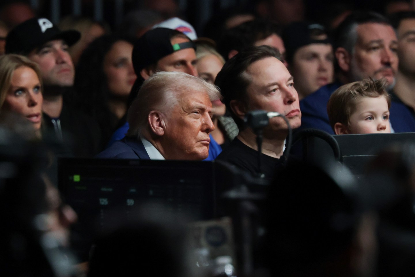 President Trump and Elon Musk take in a UFC fight in April. 