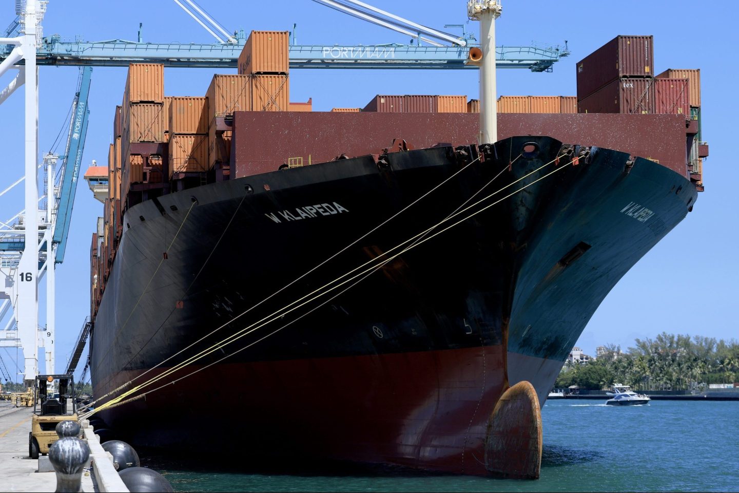 Shipping containers stacked on a cargo ship as they are off-loaded at PortMiami on April 15, 2025.