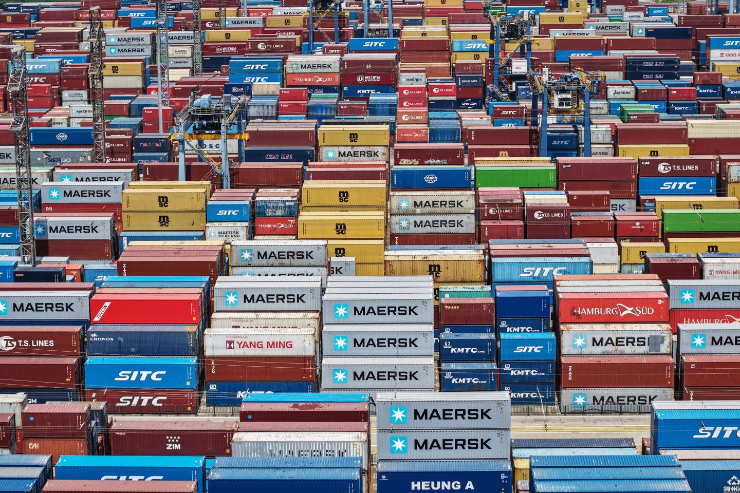 Cargo containers stacked at a port in Shanghai on April 20, 2025. (Photo: STR/AFP/Getty Images)