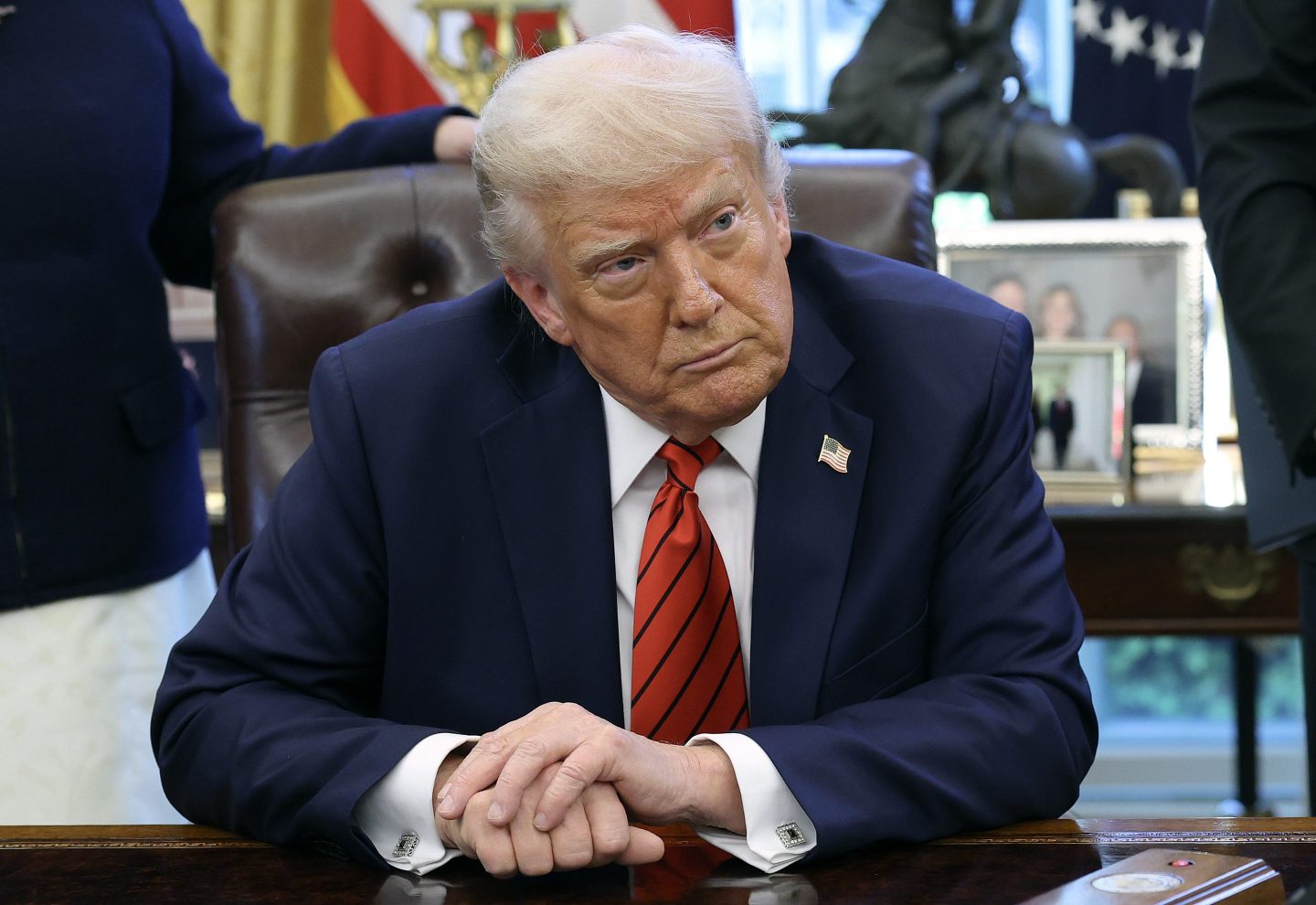 President Trump says that Federal Reserve Chair Jerome Powell is not moving fast enough on interest rate cuts.