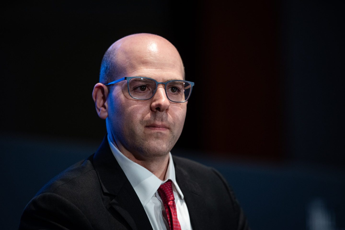 Stephen Miran, pictured from the chest up, looks out to the left of the camera.