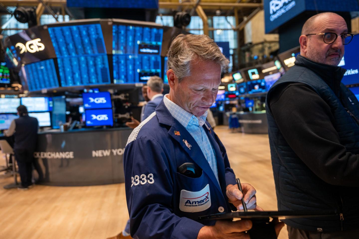 Stock trader on the floor of the New York Stock Exchange