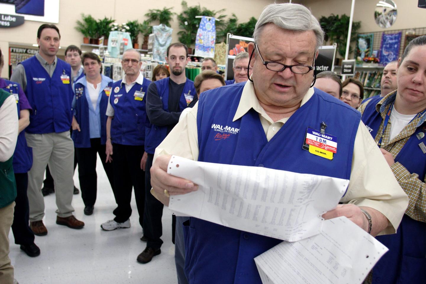 Walmart supervisor leads store employees