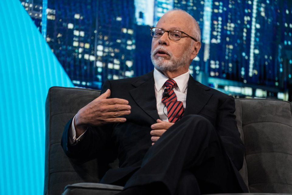 Paul Singer, founder of Elliott Investment Management Corp., sits and speaks during the Bloomberg Invest Summit in New York.