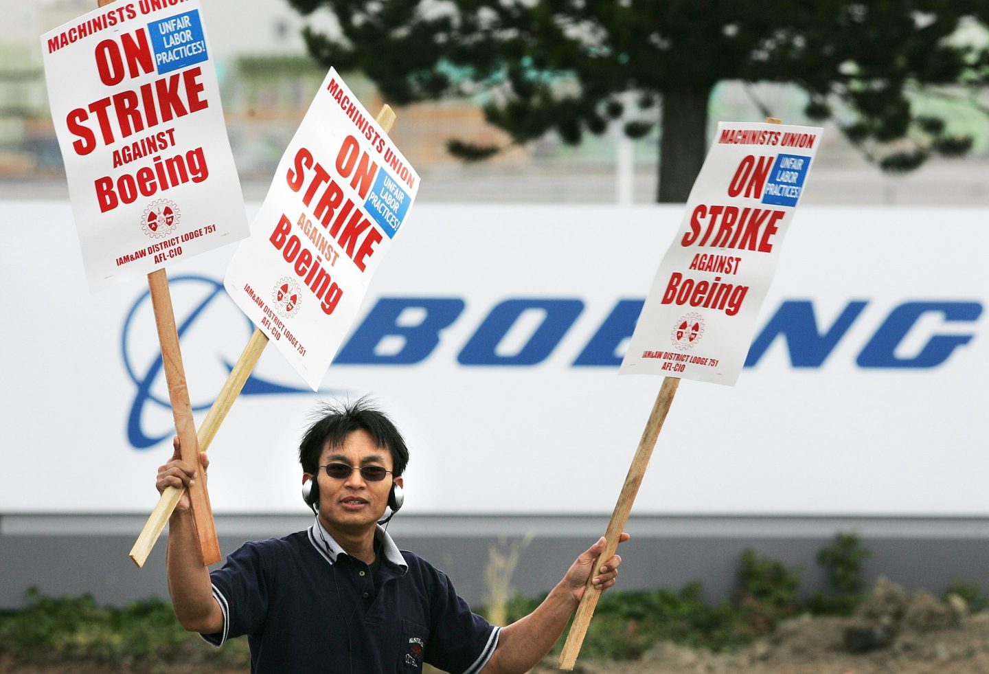 Boeing machinist Phon Duangsouvanh mans the picket line outside Boeing's plant September 6, 2008 in Everett, Washington