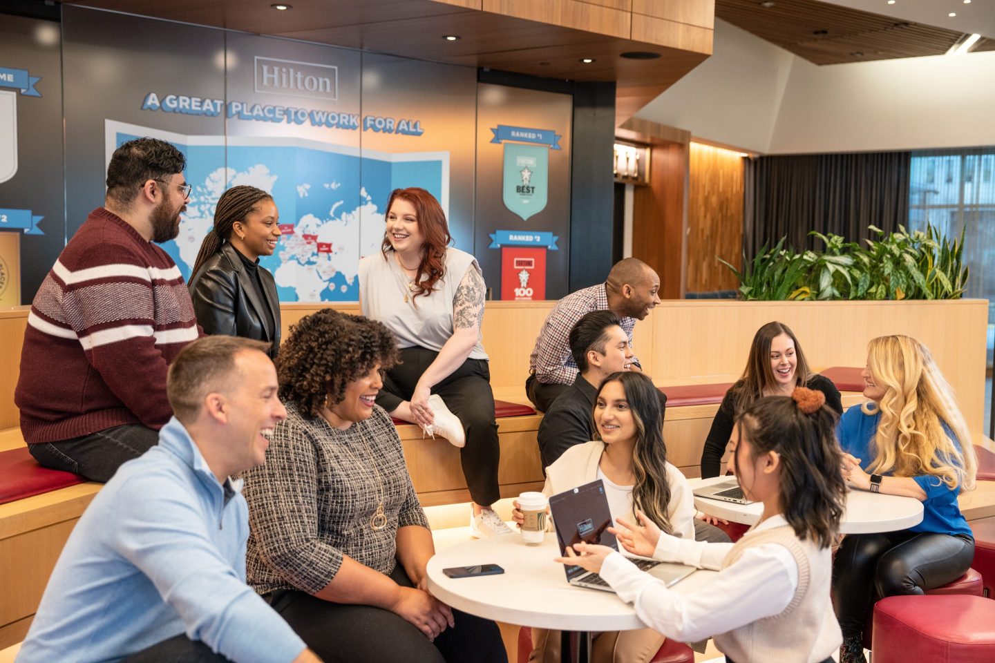 Hilton employees talking in a common area