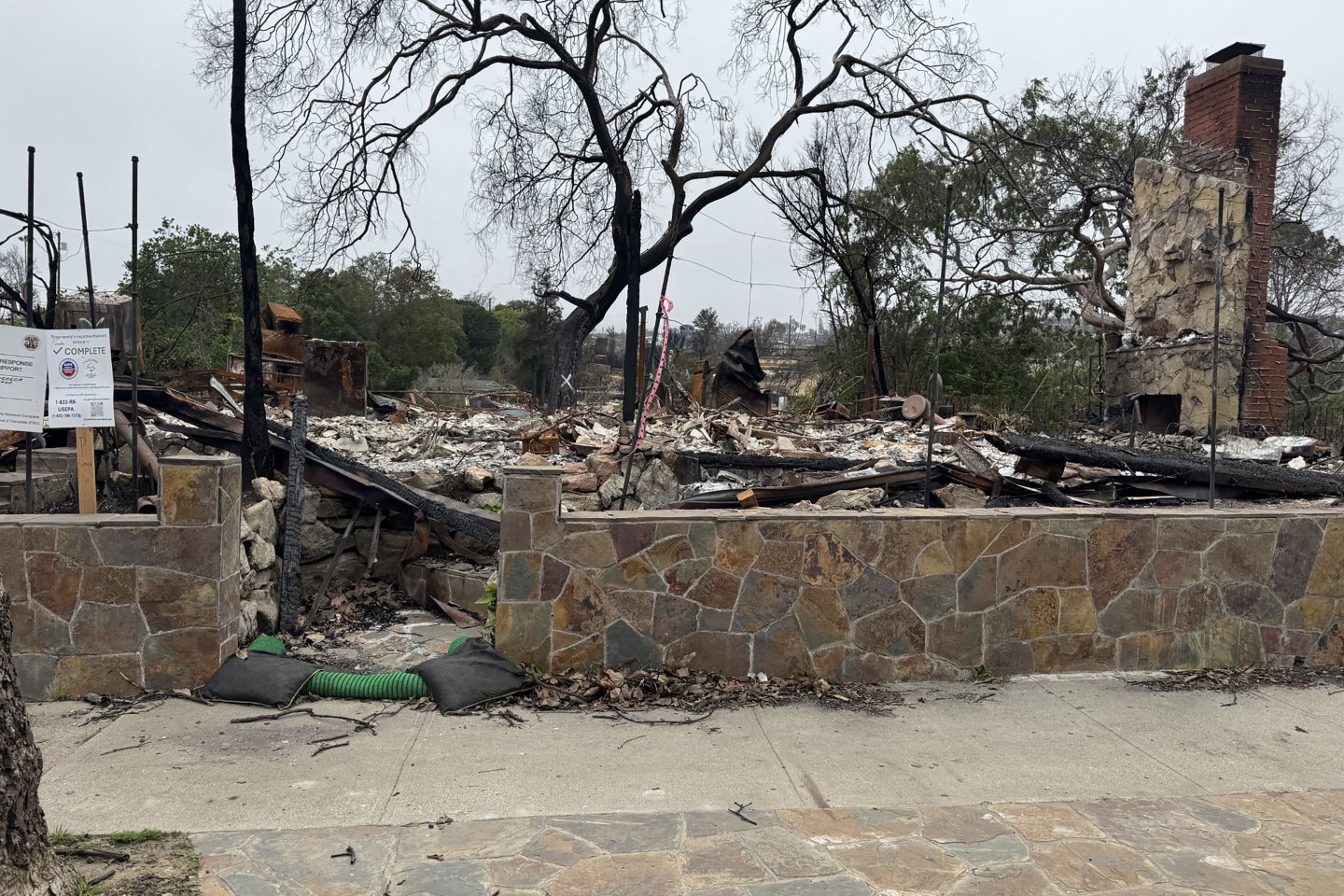 The burned, empty lot in Pacific Palisades Taft purchased for his daughter to be closer.