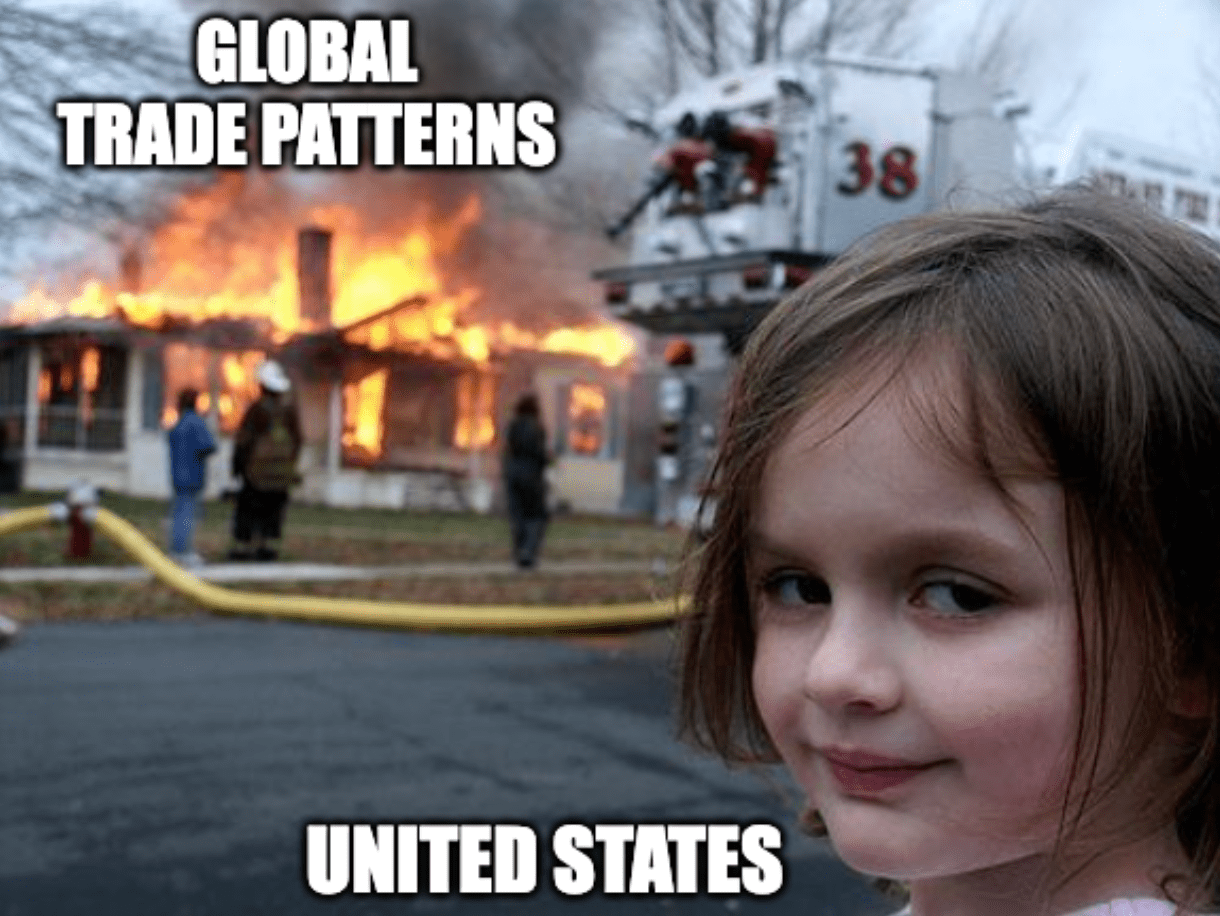 A "disaster girl" meme with the smirking girl labeled "United States" and a burning house labeled "global trade patterns"