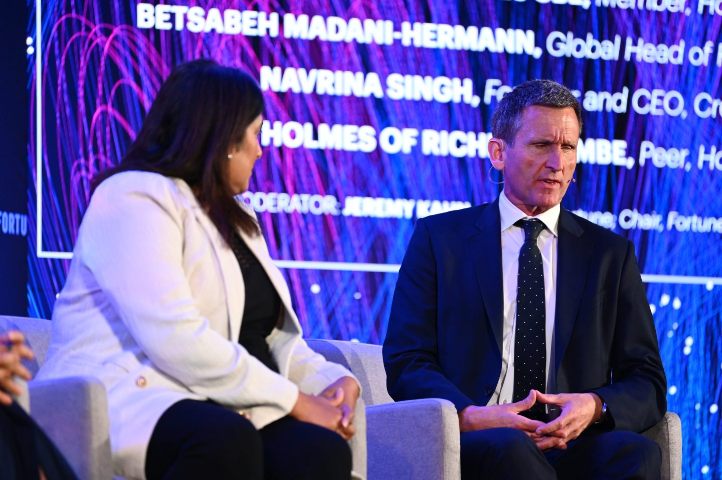 Lord Chris Holmes of Richmond speaks at the Coins2Day Brainstorm AI conference.