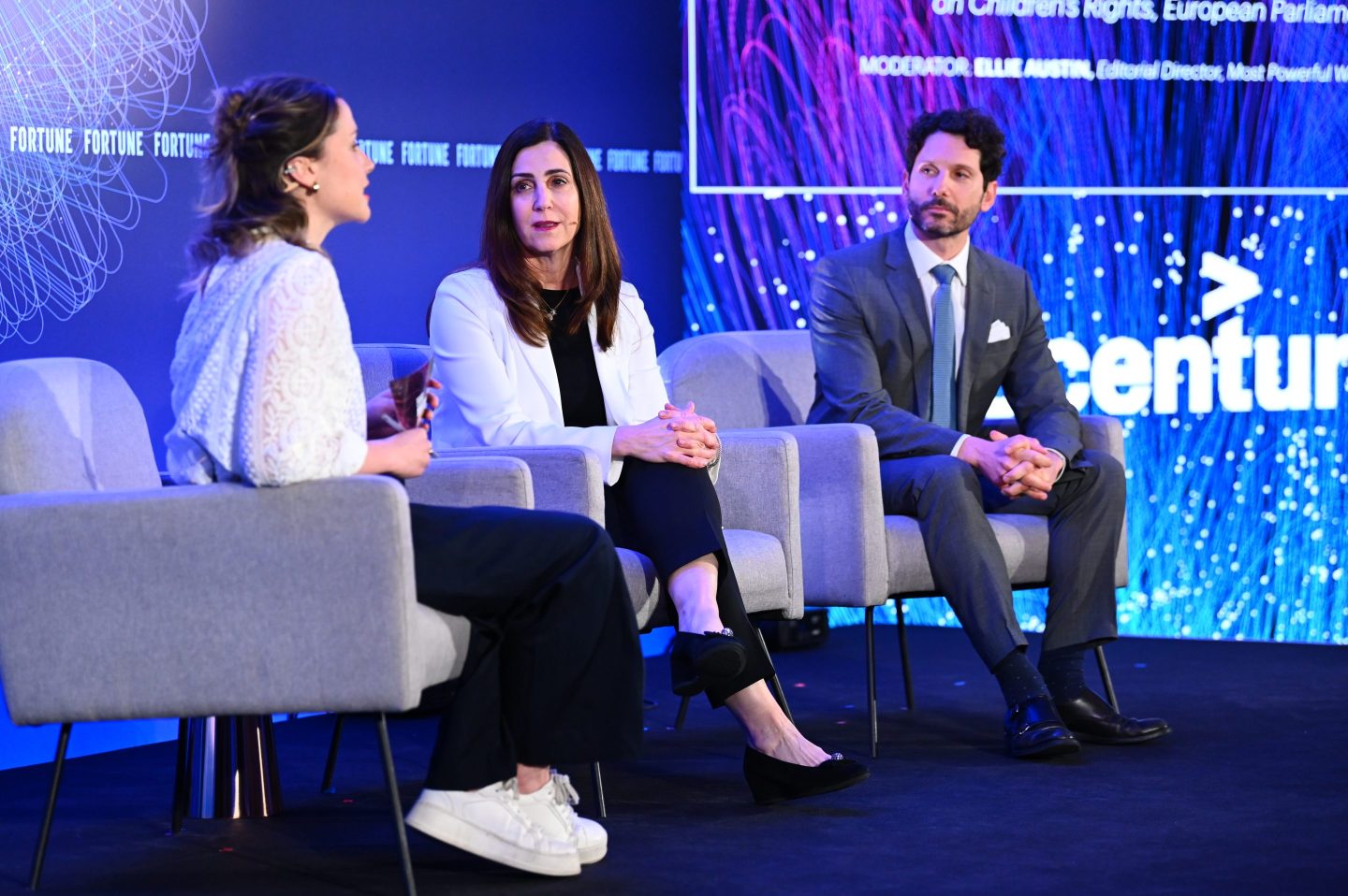 Ellie Austin, editorial director for Fortune Most Powerful Women, interviews Baroness Joanna Shields, OBE, the founder of the WeProtect Global Alliance (center) and Emilio Puccio, the Secretary General of the European Parliament intergroup on children’s rights.