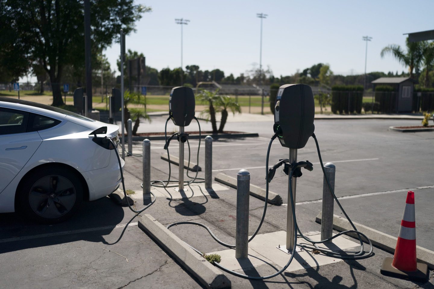 Electric vehicle chargers are seen in the parking lot of South El Monte High School in South El Monte, Calif., Aug. 26, 2022.