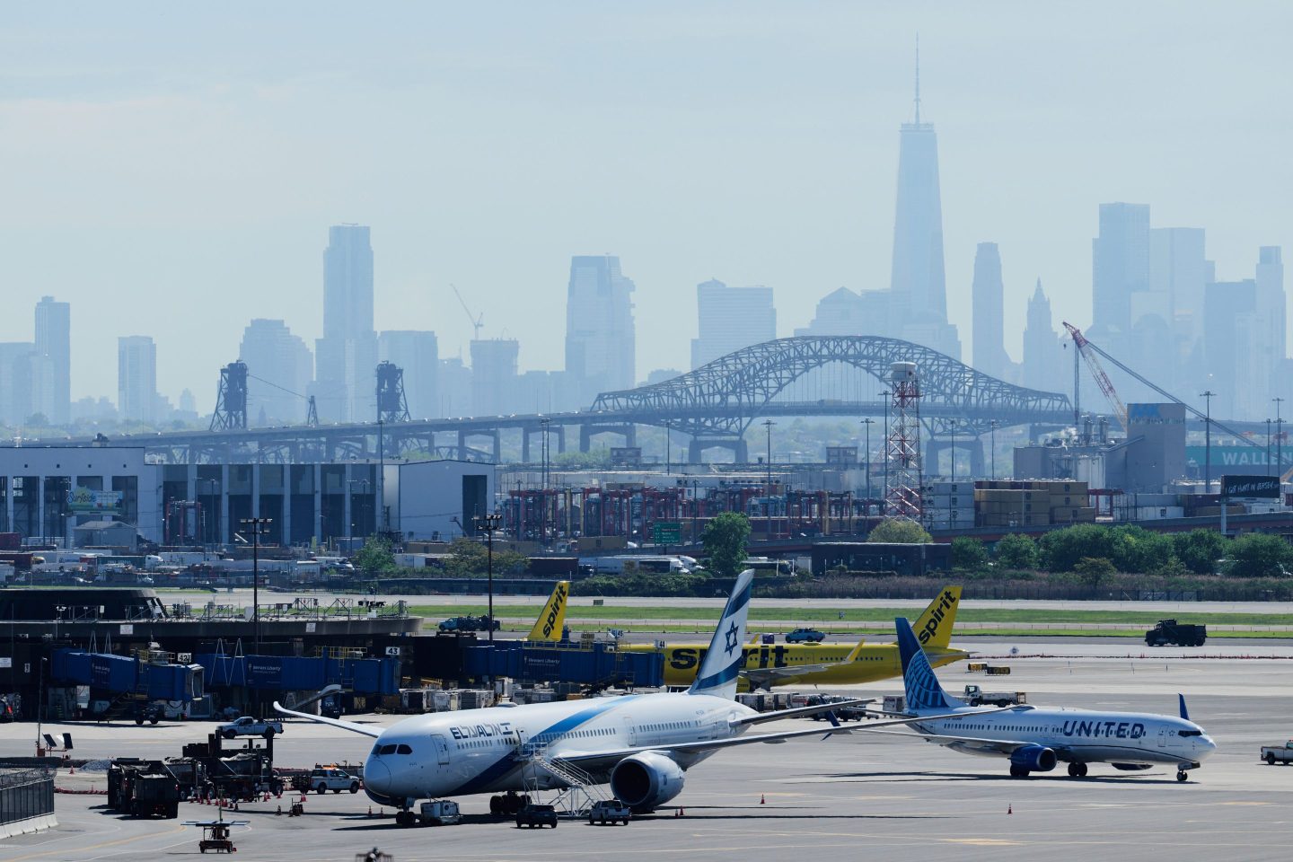 The New York City skyline is seen behind Newark Liberty International Airport, on May 7, 2025.
