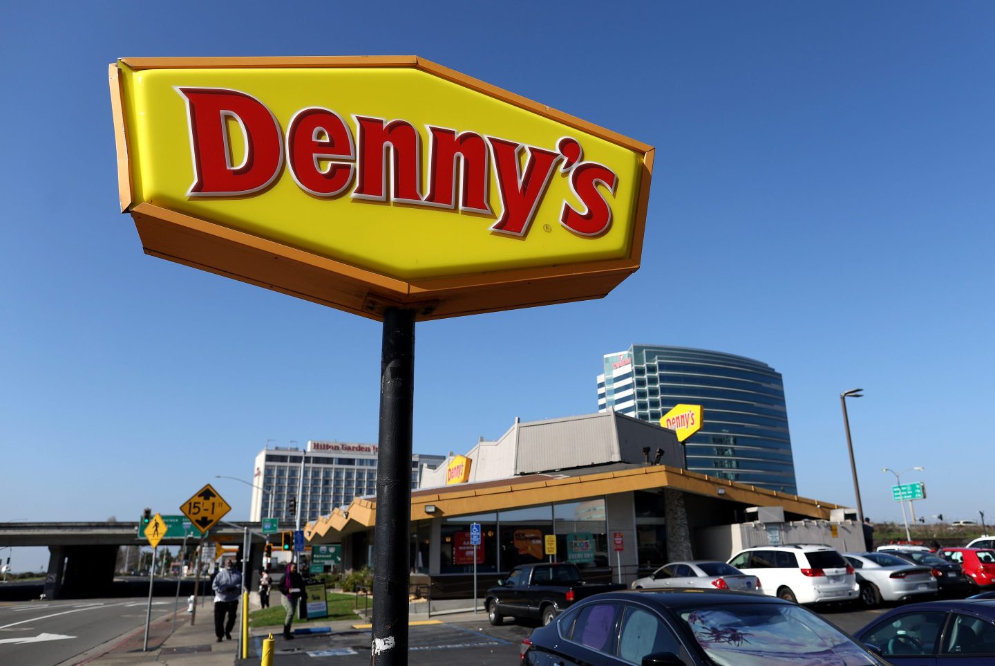 Denny's side in front of a restaurant