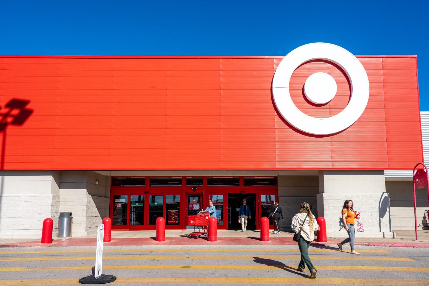 people walking into Target store