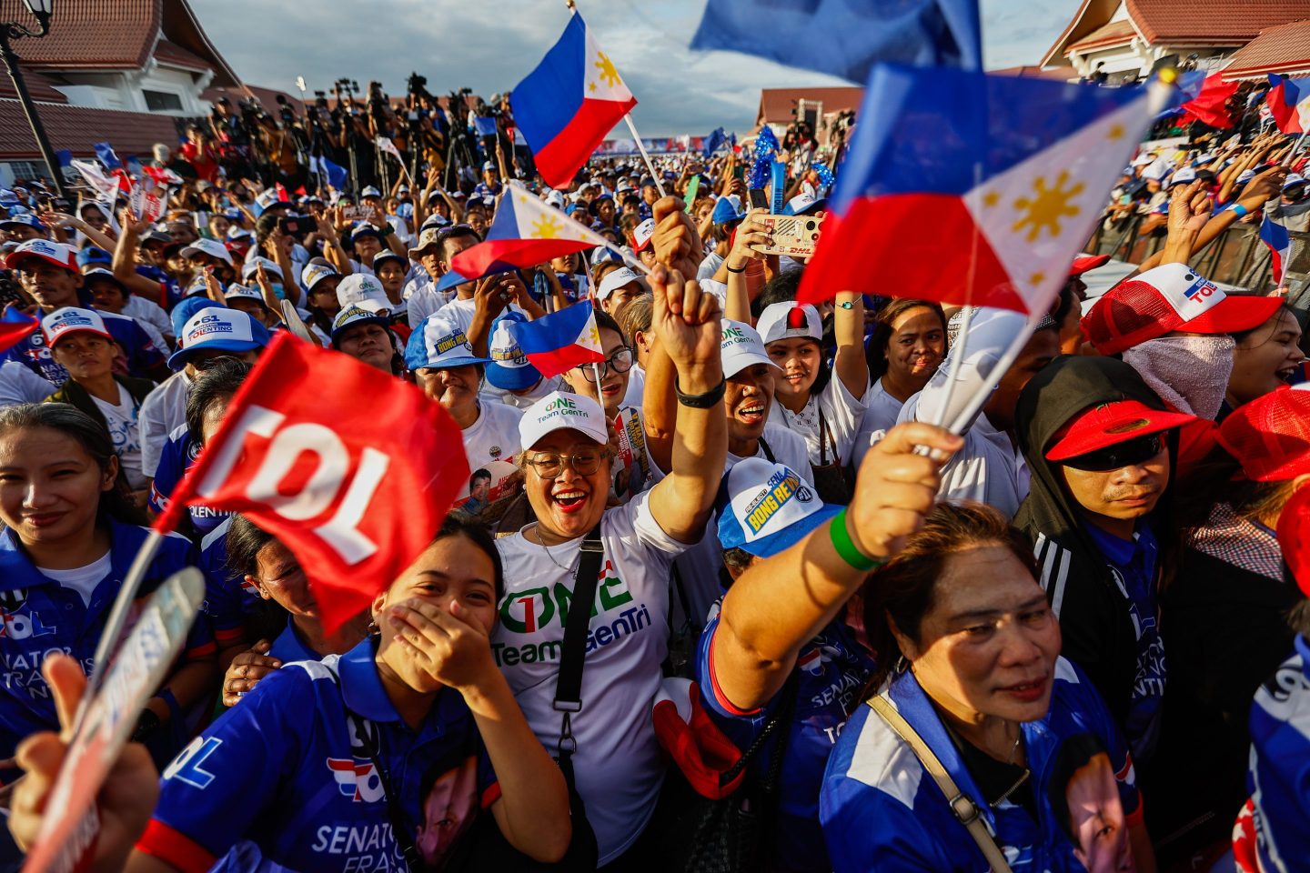 Supporters take part in a mid-term election rally for a political alliance led by Philippines President Ferdinand 'Bongbong' Marcos Junior, in Cavite Province, Philippines, on March 21, 2025.