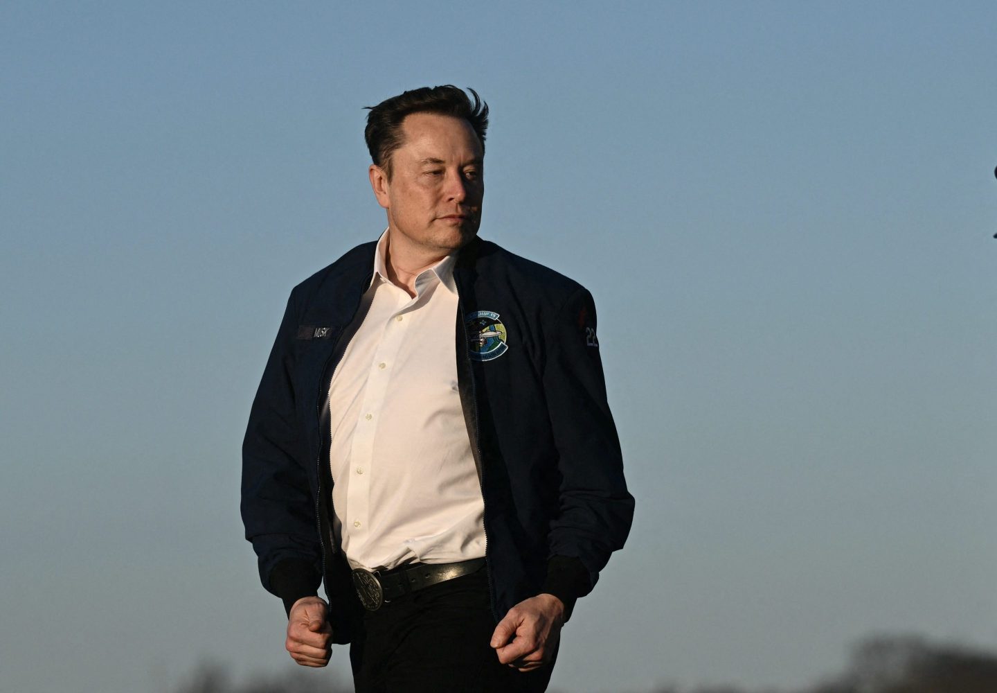 Elon Musk steps off Air Force One upon arrival at Morristown Municipal Airport in Morristown, New Jersey, on March 22, 2025.
