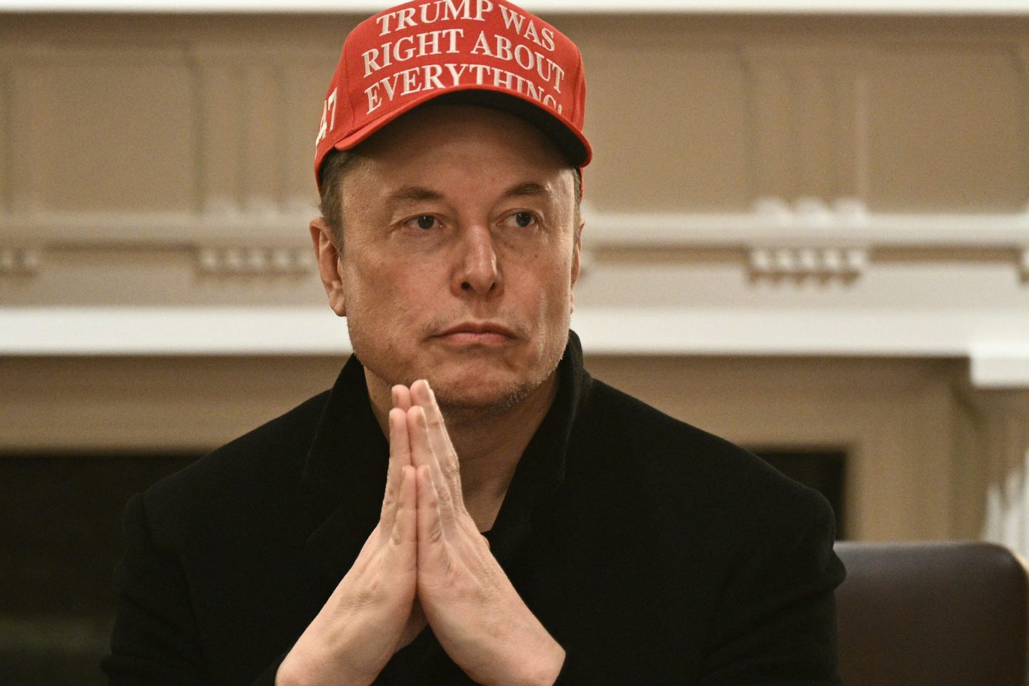 Elon Musk looks on as US President Donald Trump hosts a cabinet meeting in the Cabinet Room of the White House in March.