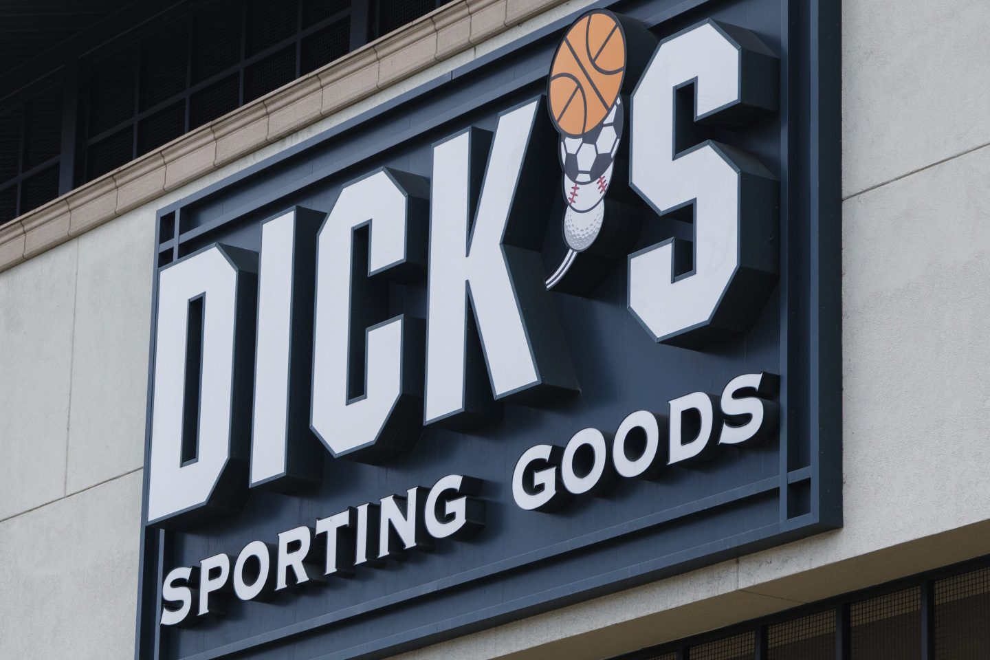 A Dick's Sporting Goods logo is displayed outside one of their stores on March 23, 2025 in San Diego.