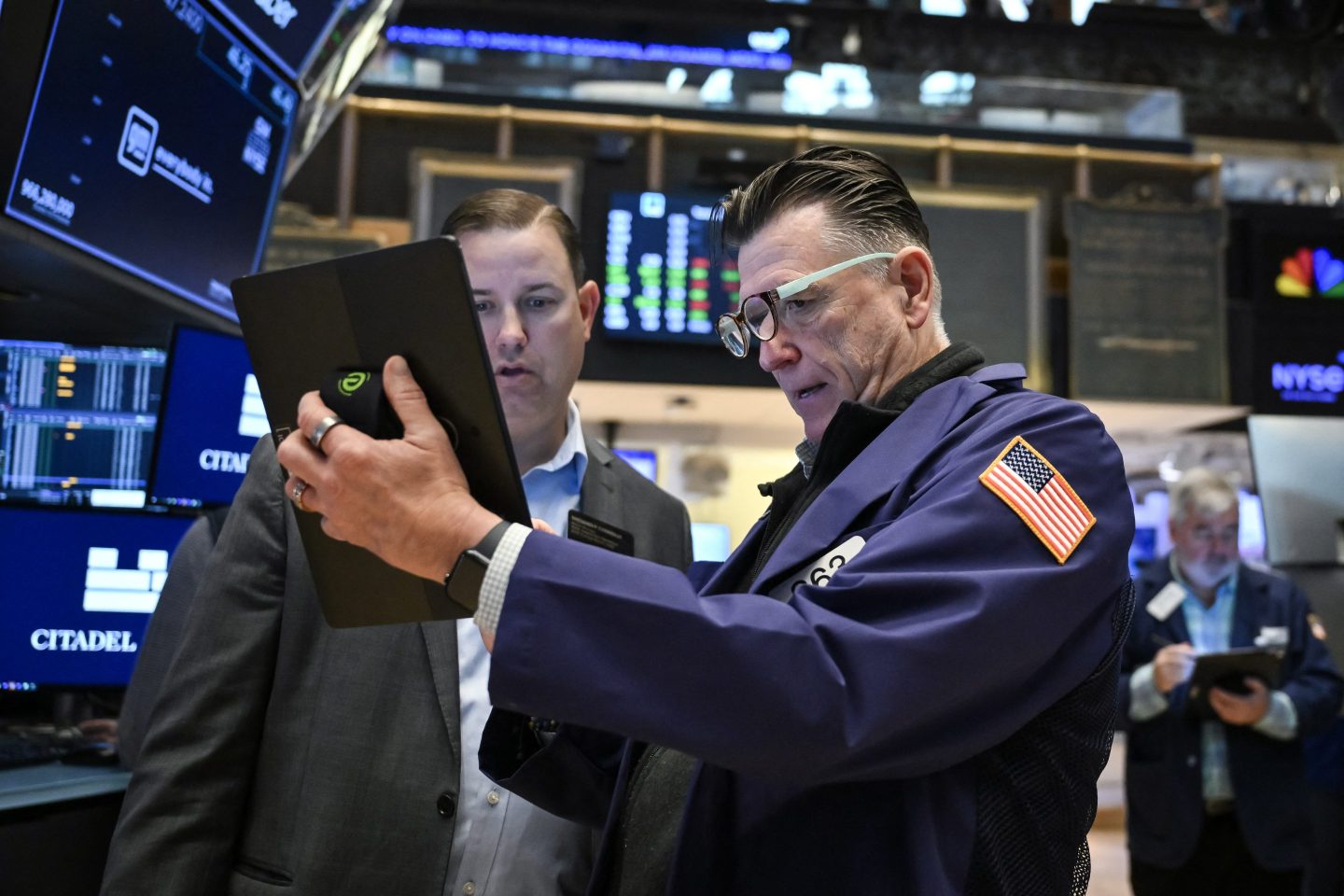 Traders work on the floor of the New York Stock Exchange.