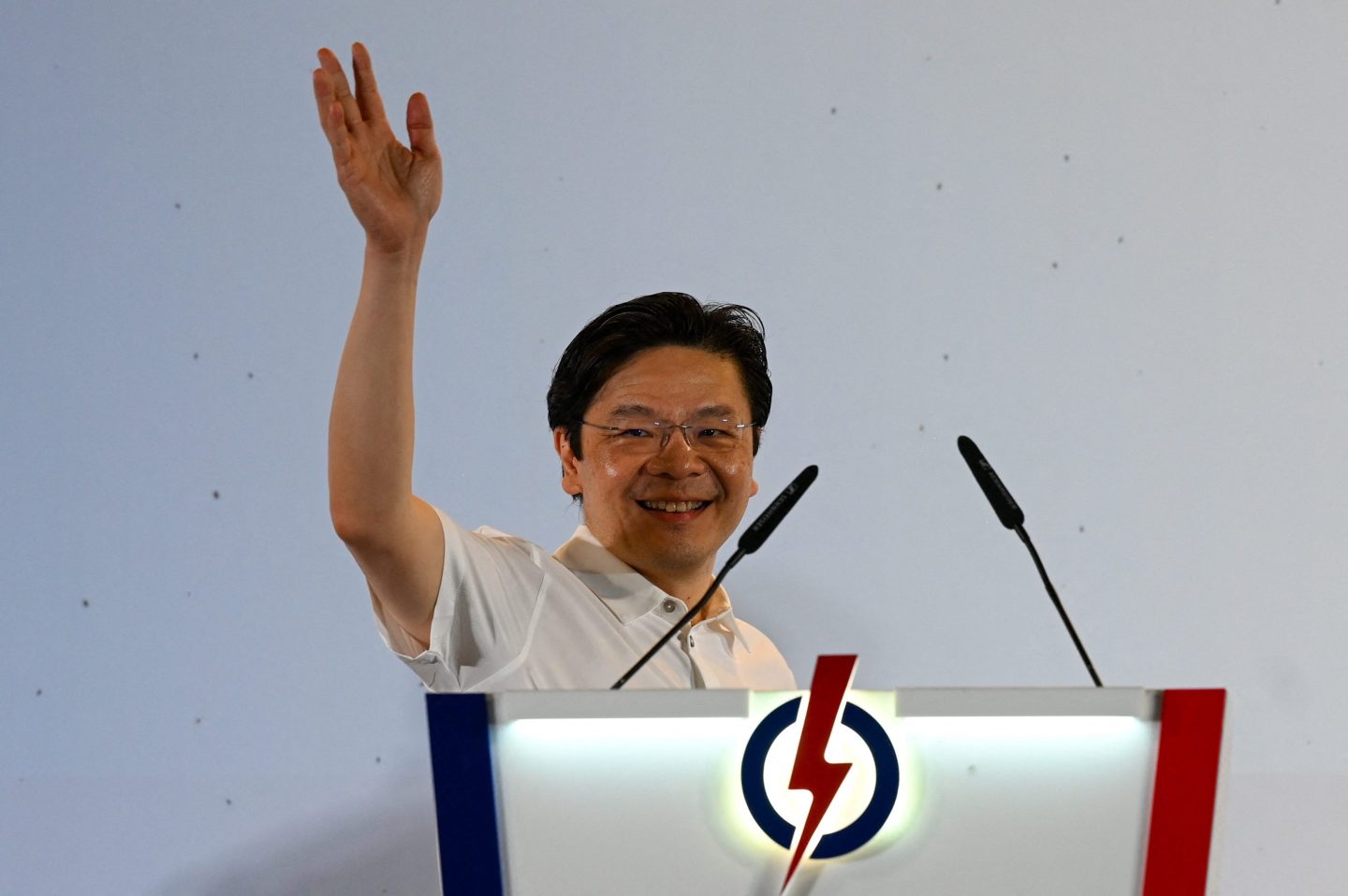 Singapore Prime Minister Lawrence Wong of the People's Action Party (PAP) celebrates at the party's gathering center during the general election results in Singapore on May 3, 2025.