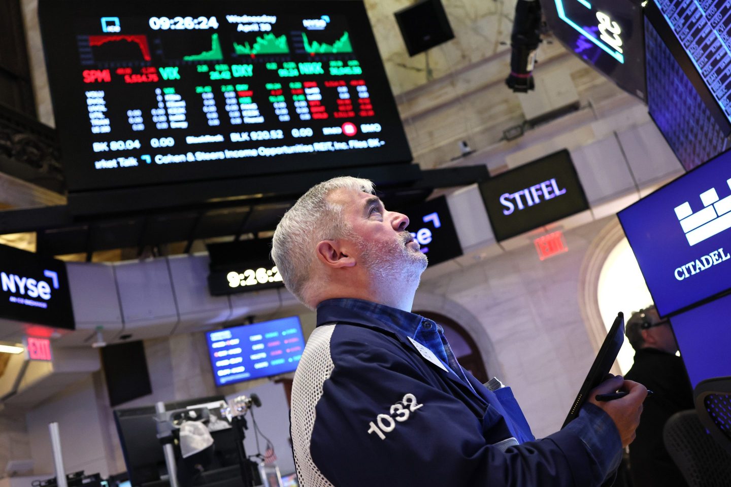 Traders work on the floor of the New York Stock Exchange