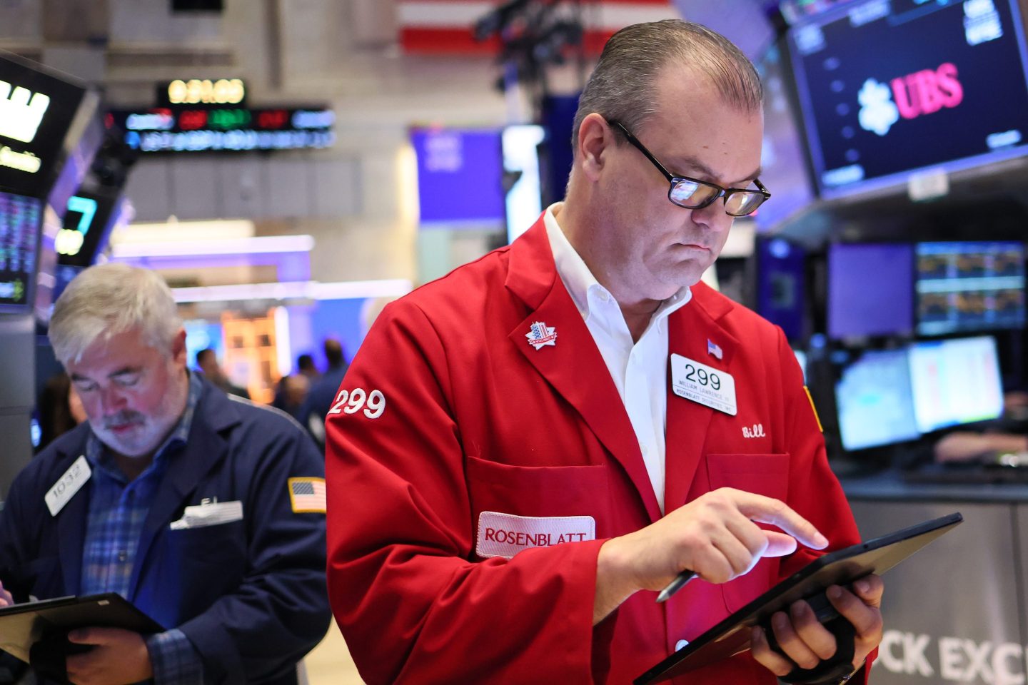 Trader in a red suit