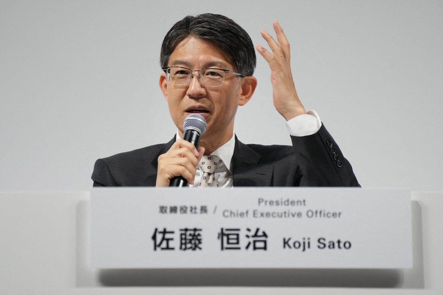 Toyota Motor President and CEO Koji Sato answers questions during a press briefing for the company's financial results in Tokyo on May 8.
