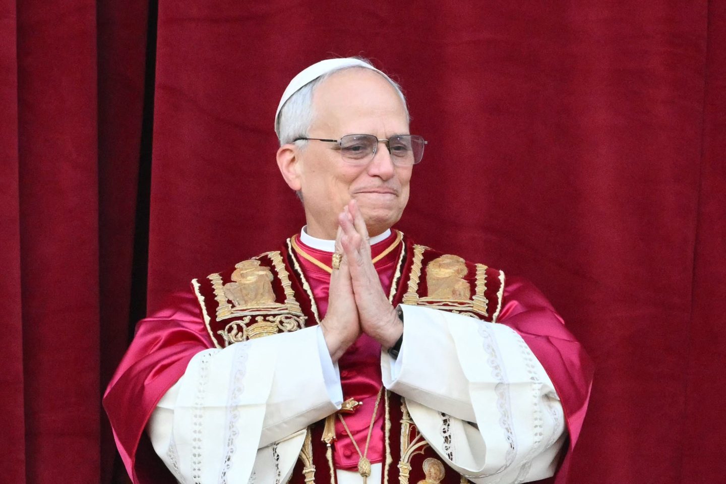 Newly elected Pope Leo XIV, Robert Prevost, arrives on the main central loggia balcony of St. Peter’s Basilica for the first time.