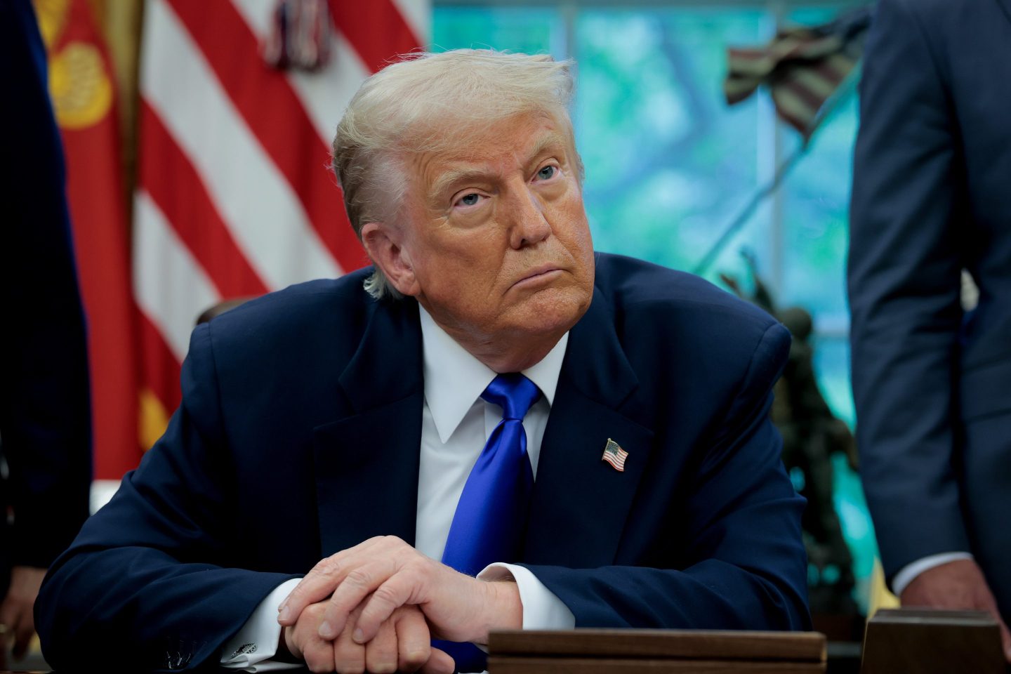 U.S. President Donald Trump takes a question from a reporter in the Oval Office at the White House on May 05, 2025 in Washington, DC. Trump signed new proclamations and executive orders.