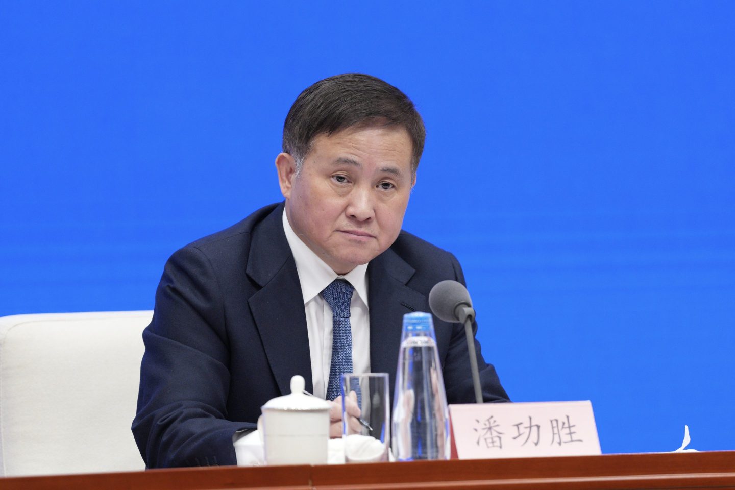On Wednesday, the head of China's central bank Pan Gongsheng told a news conference that Beijing would cut a key interest rate and lower the amount banks must hold in reserve in order to boost lending.
