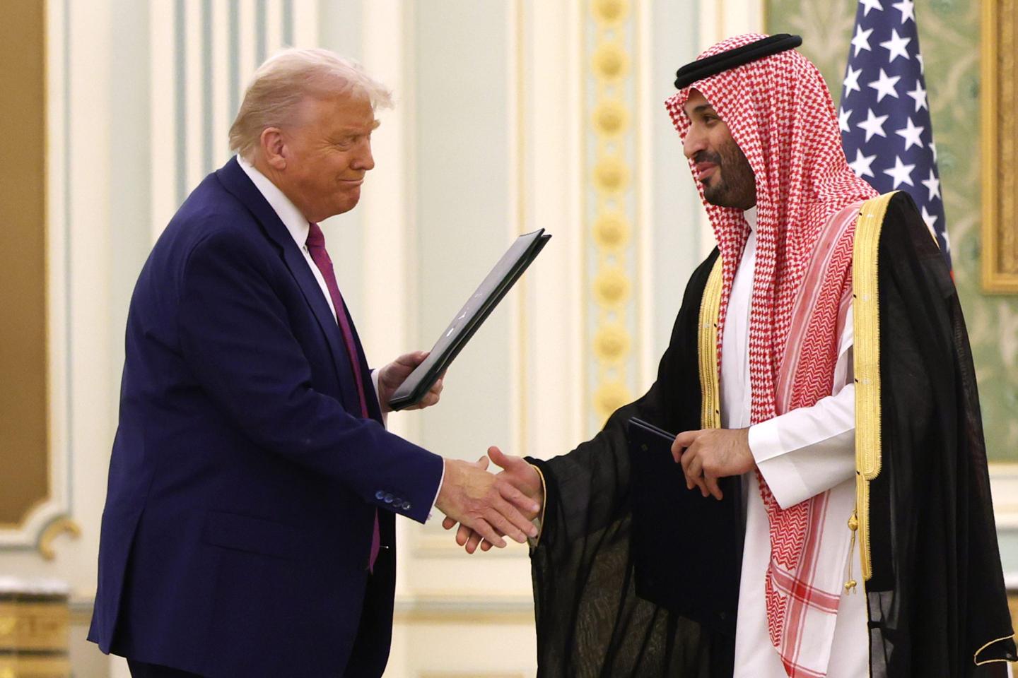 President Donald Trump and Saudi Crown Prince Mohammed bin Salman shake hands during Trump's visit to Riyadh.