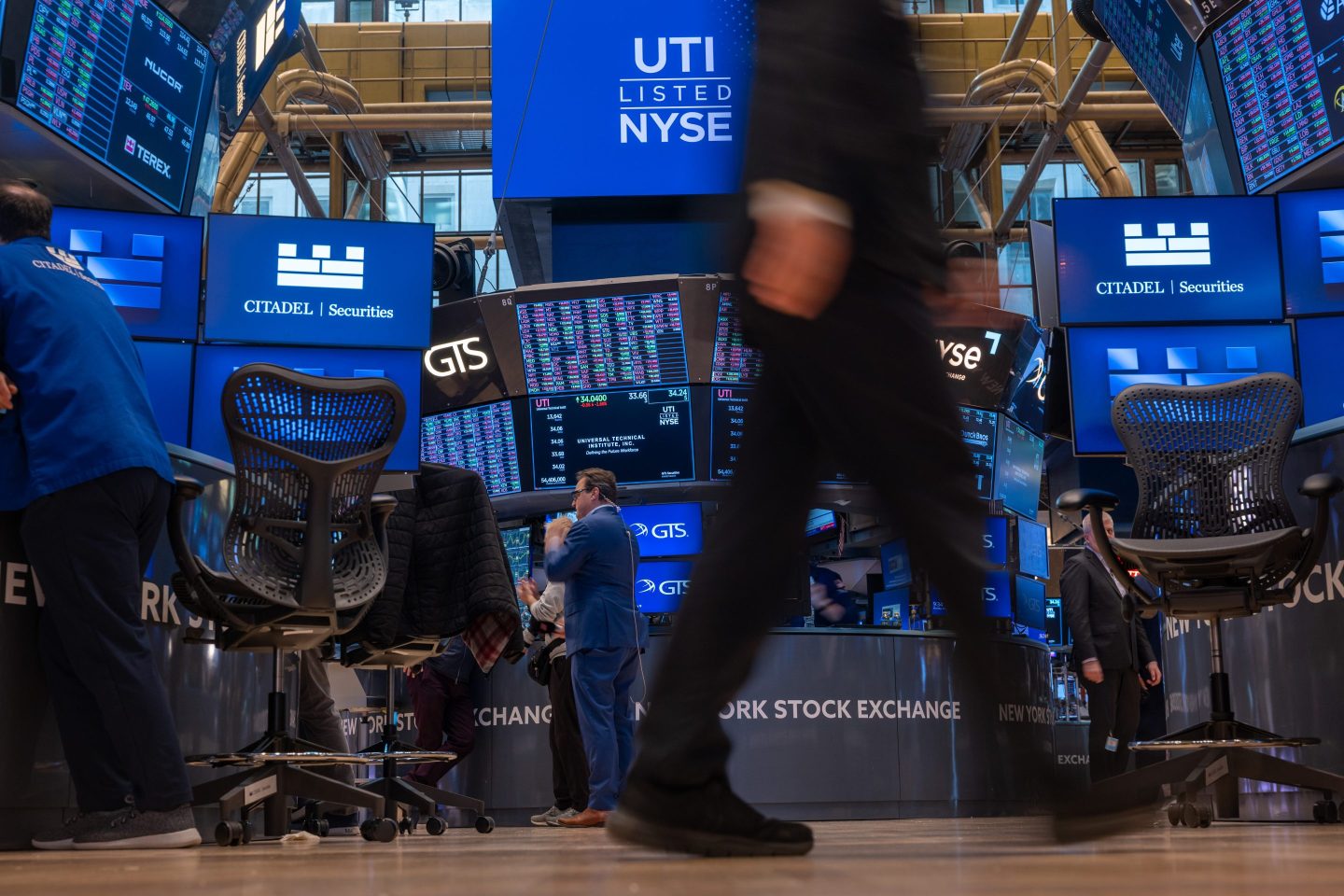 The S&P 500 was largely flat Monday, recouping earlier losses after Moody's lowered the U.S. credit rating.