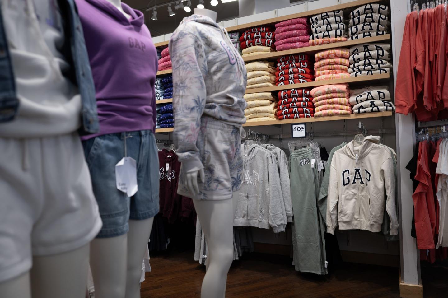 Gap sweaters and clothes in a store
