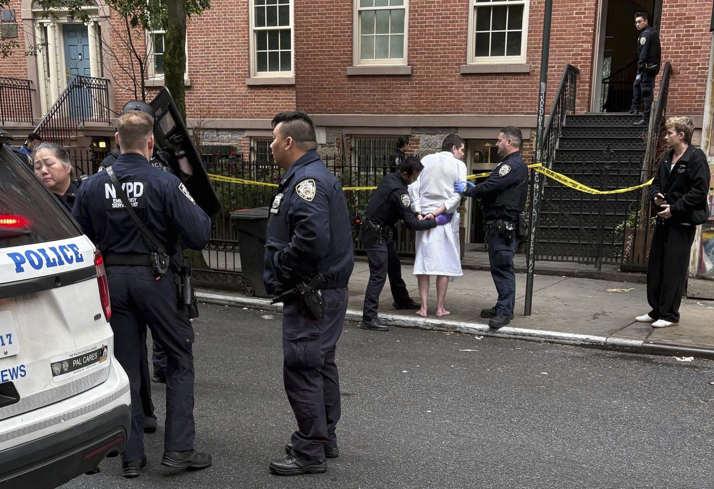 2 crypto investors charged with kidnapping man to get his bitcoin say video shows victim ‘laughing and smiling’ as he moves about Manhattan freely