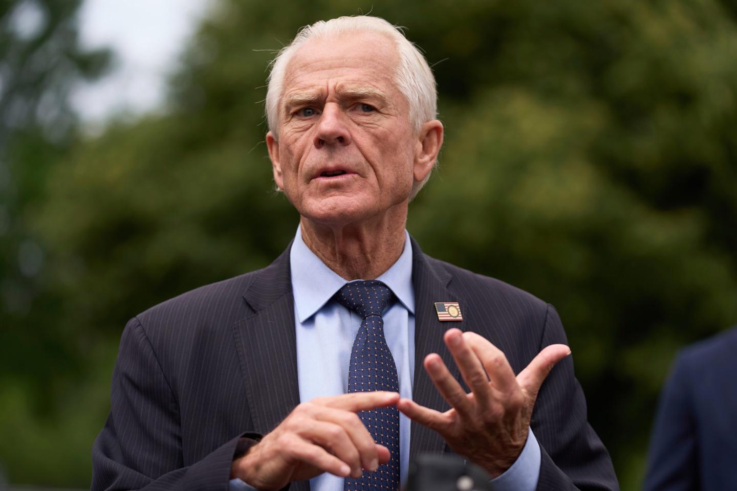 DOJ is dropping its lawsuit against Trump trade adviser Peter Navarro for wrongfully retaining presidential records