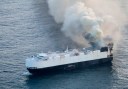 Ship in North Pacific carrying 3,000 cars catches fire, forcing 22 crew members to be rescued from lifeboat