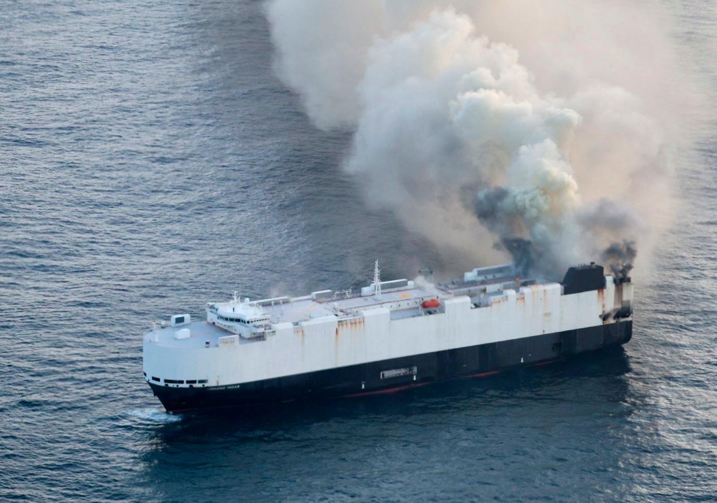 Ship in North Pacific carrying 3,000 cars catches fire, forcing 22 crew members to be rescued from lifeboat