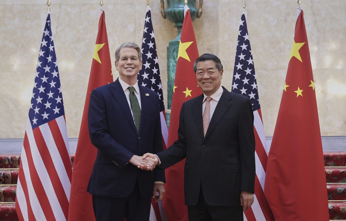 Chinese Vice Premier He Lifeng, right, shakes hands with U.S. Treasury Secretary Scott Bessent before their meeting to discuss China-U.S. trade, in London, on June 9, 2025.