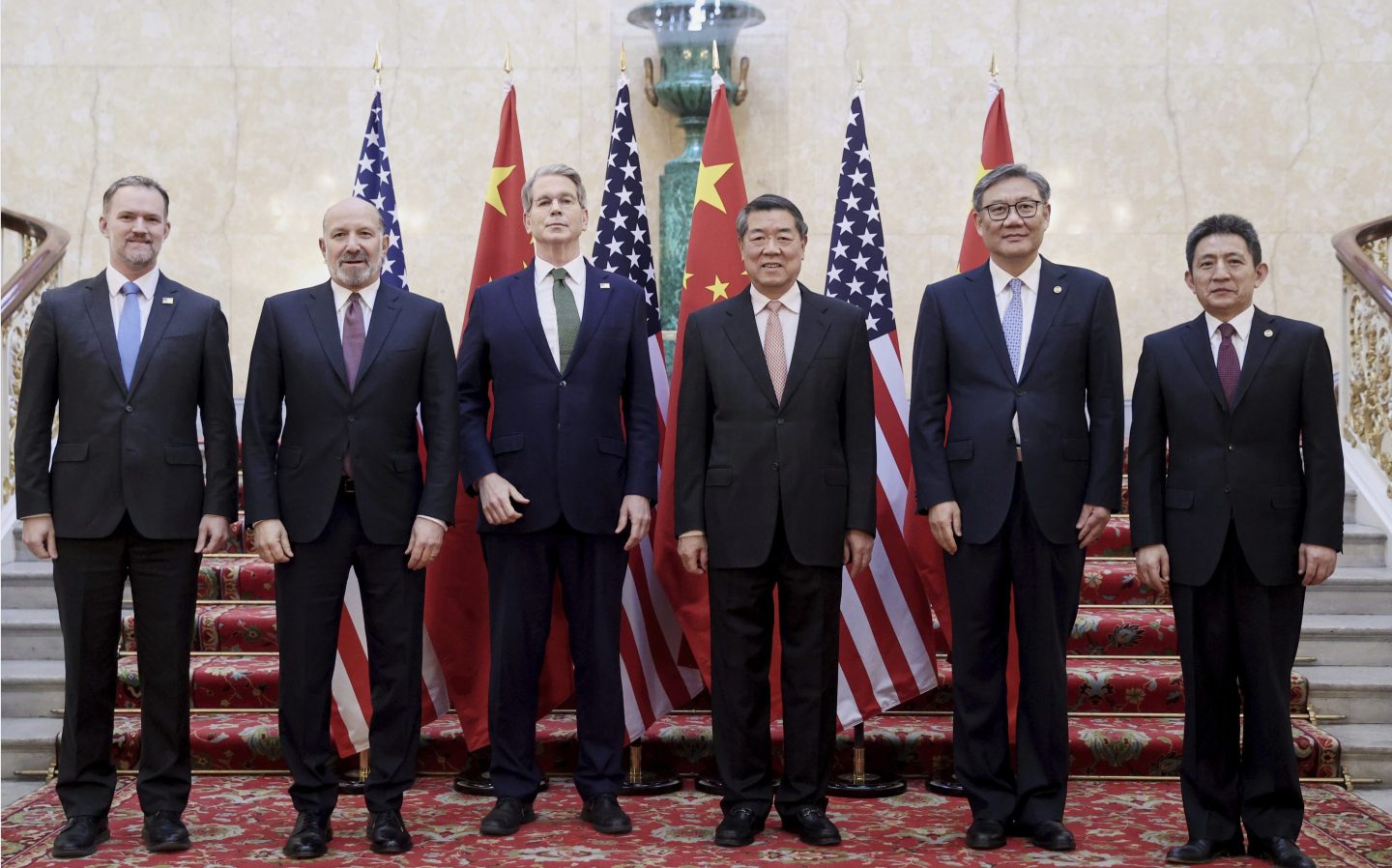 Chinese Vice Premier He Lifeng, center right, and U.S. Treasury Secretary Scott Bessent, center left, pose for a group photo with delegations before their meeting to discuss China-U.S. trade, in London, on June 9, 2025.